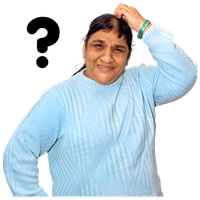Elderly woman in a light blue sweater smiling and touching her head.