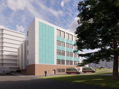 Architectural visualisation of a proposed hospital building with white and teal-coloured external panels and large windows, connected to an existing multi-storey hospital tower. Two emergency ambulances are parked outside the entrance, with pedestrians walking around landscaped grassy areas and mature trees. The image shows the development in daylight under a bright, partly cloudy sky.