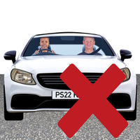 Front view of a white car with two smiling people inside, with a red X symbol covering the front of the car