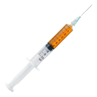 A syringe filled with orange liquid and a needle.