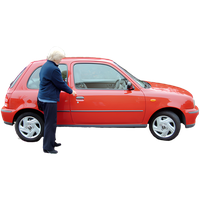 Woman opening the driver's side door of a small red car.