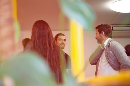 Image of people talking in a room